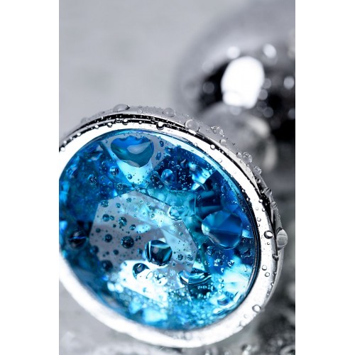 Серебристая конусовидная анальная пробка с голубым кристаллом - 7 см.